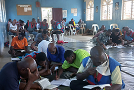 Theodist Empowers Bomana Prison Bible Program with Stationery Support